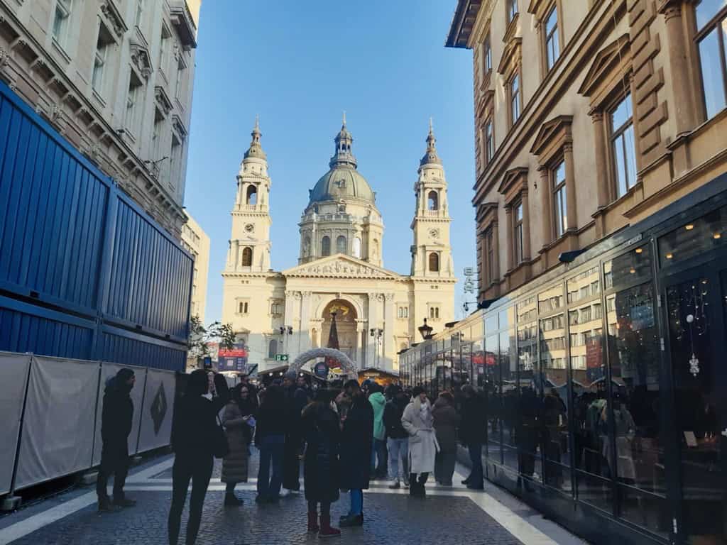 People walking near the St. Stephen's Basilica in Budapest, Hungary.