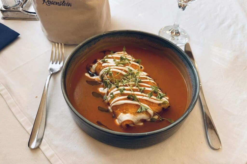 Hortobágyi Palacsinta on a plate, a traditional Hungarian dish.