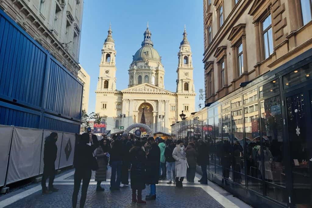 People walking near the St. Stephen's Basilica in Budapest, Hungary.