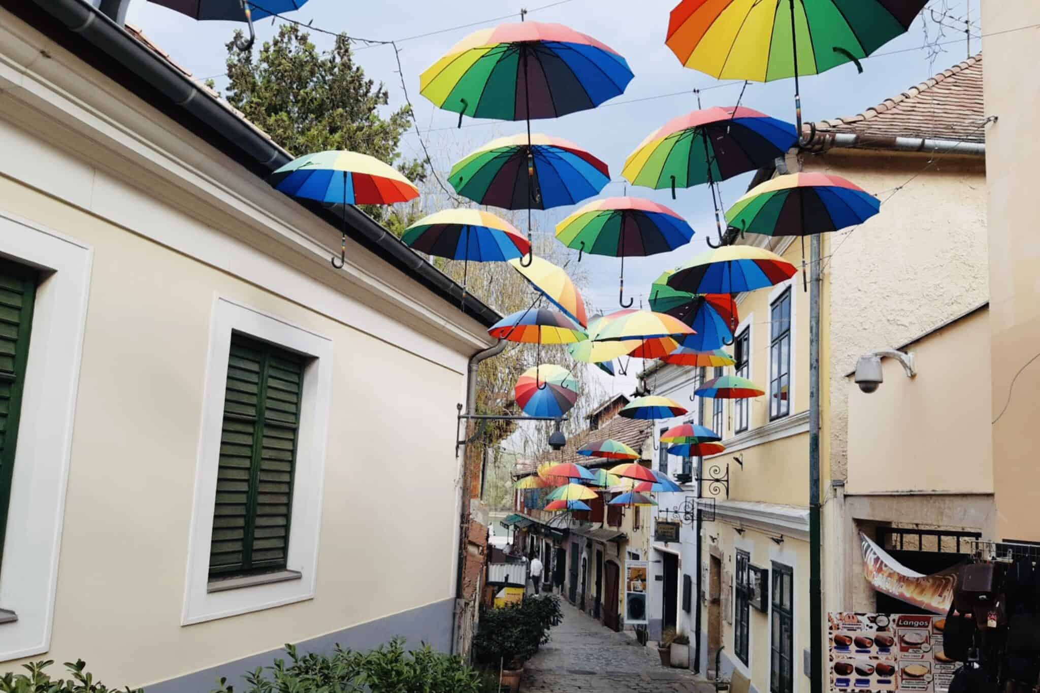 Colourful umbrellas hanging in the air in Szentendre, Hungary.