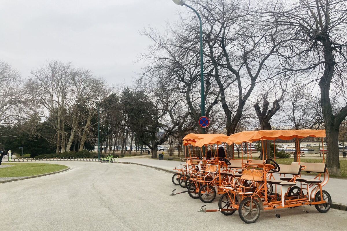 Bringóhintó, a funny vehicle you have to pedal like a bike on Margaret Island, Budapest.