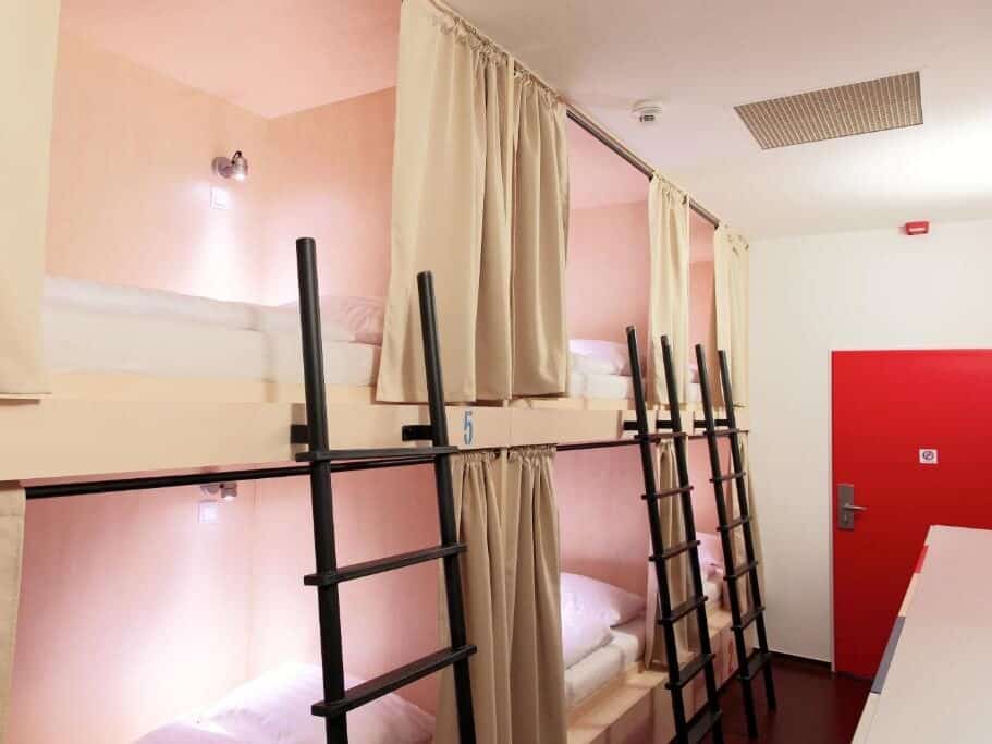 A dorm room with bunk beds at the Maverick Budapest Soho Hotel.